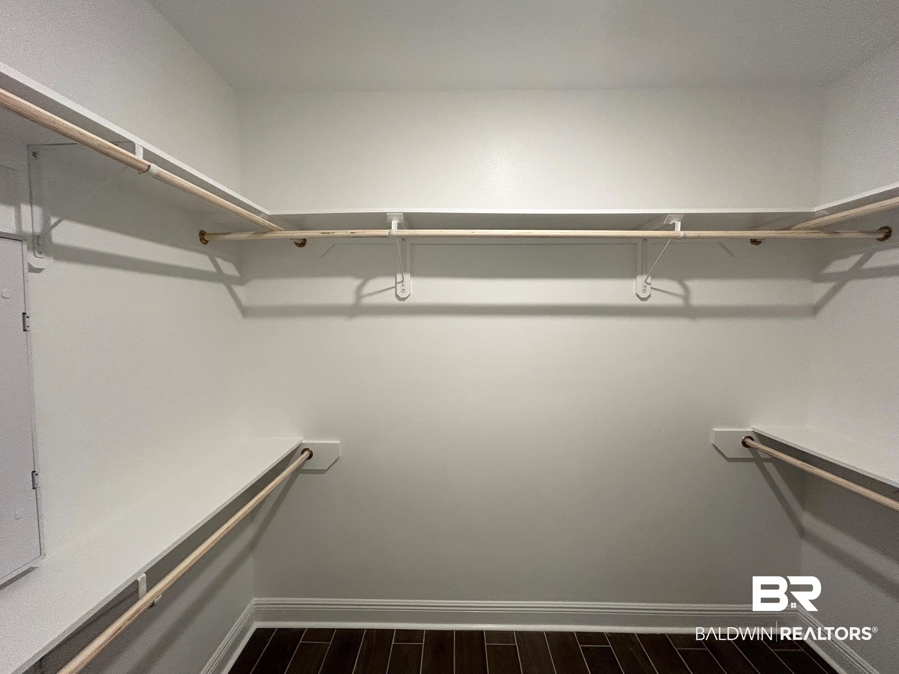 844 Sumter Loop Foley, AL 36535 - Photo 12 of 18 Spacious closet featuring dark hardwood / wood-style floors