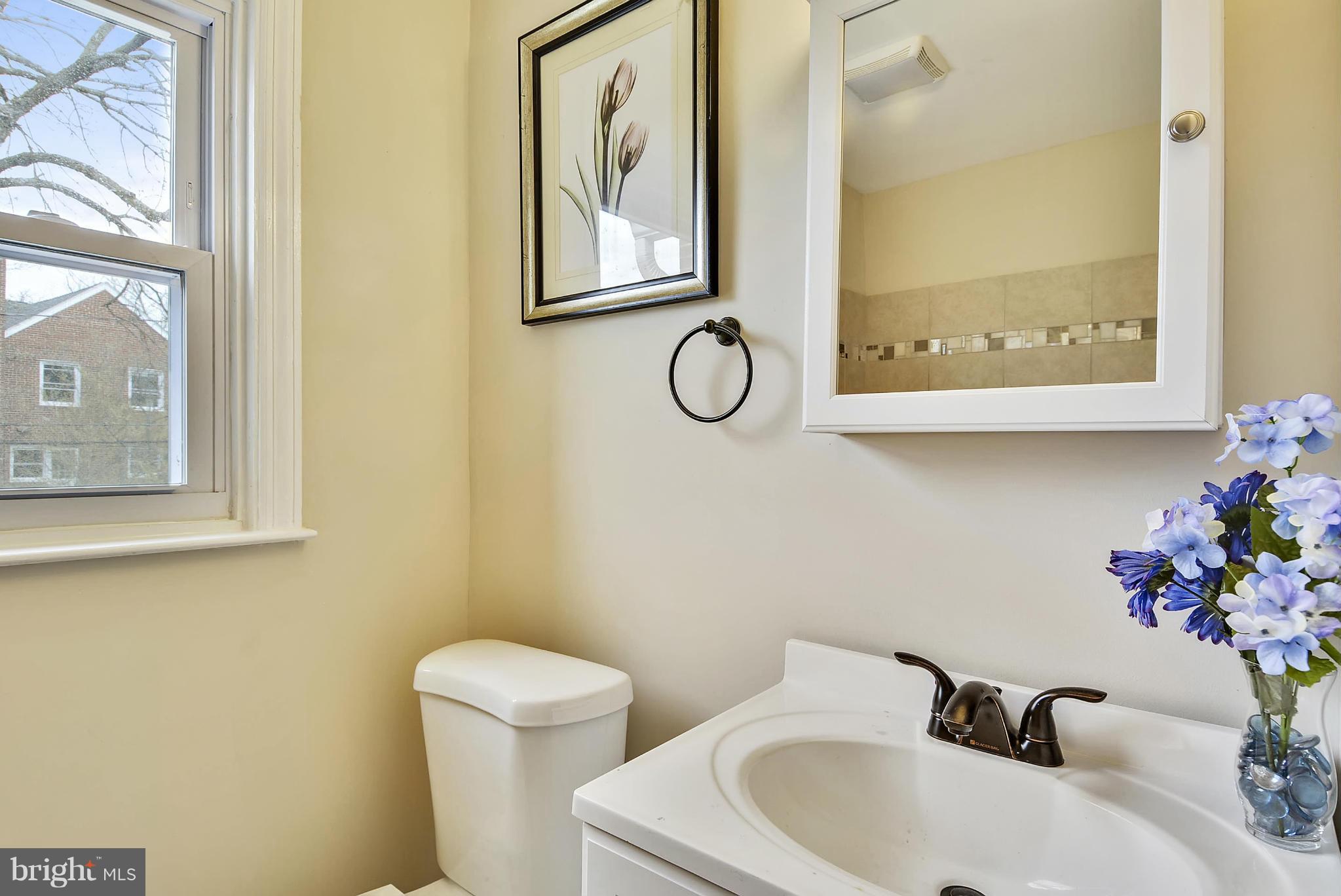1602 Heathfield Road Baltimore, MD 21239 - Photo 12 of 27 a bathroom with a toilet sink and tub