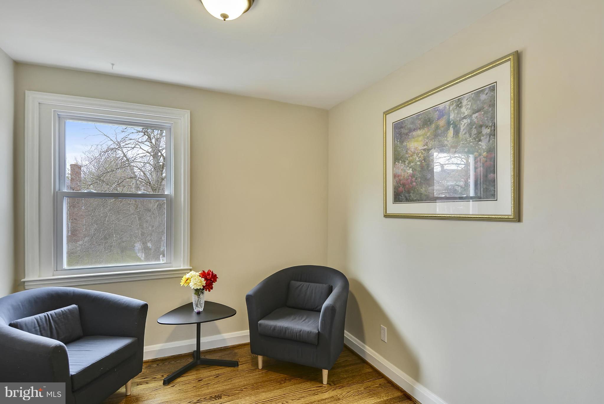 1602 Heathfield Road Baltimore, MD 21239 - Photo 16 of 27 a living room with furniture and a window