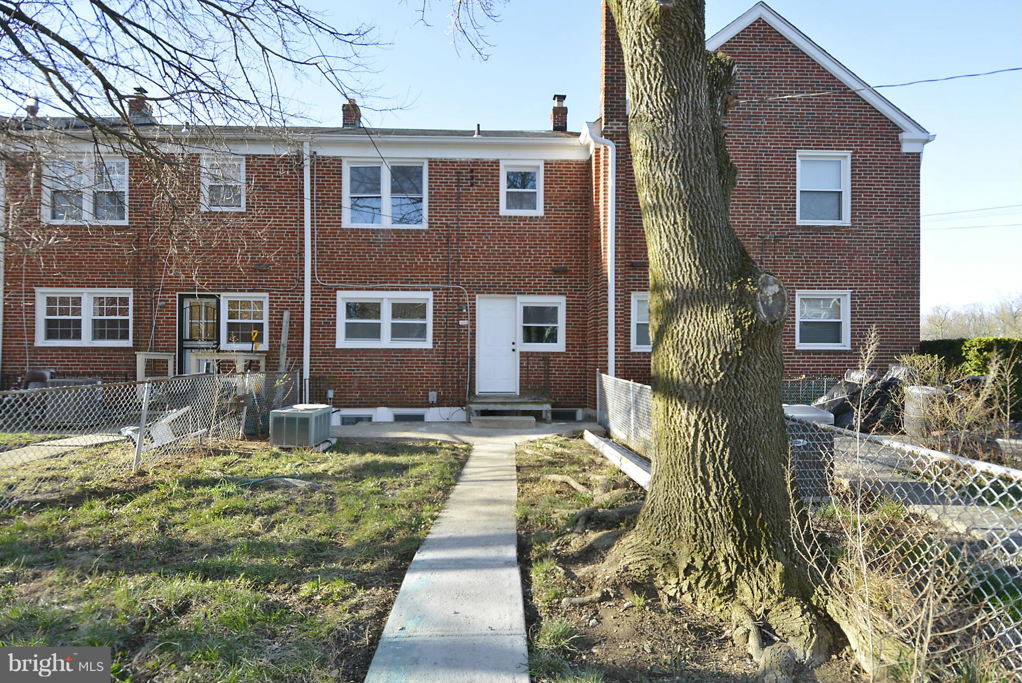 1602 Heathfield Road Baltimore, MD 21239 - Photo 27 of 27 a front view of a house with a yard
