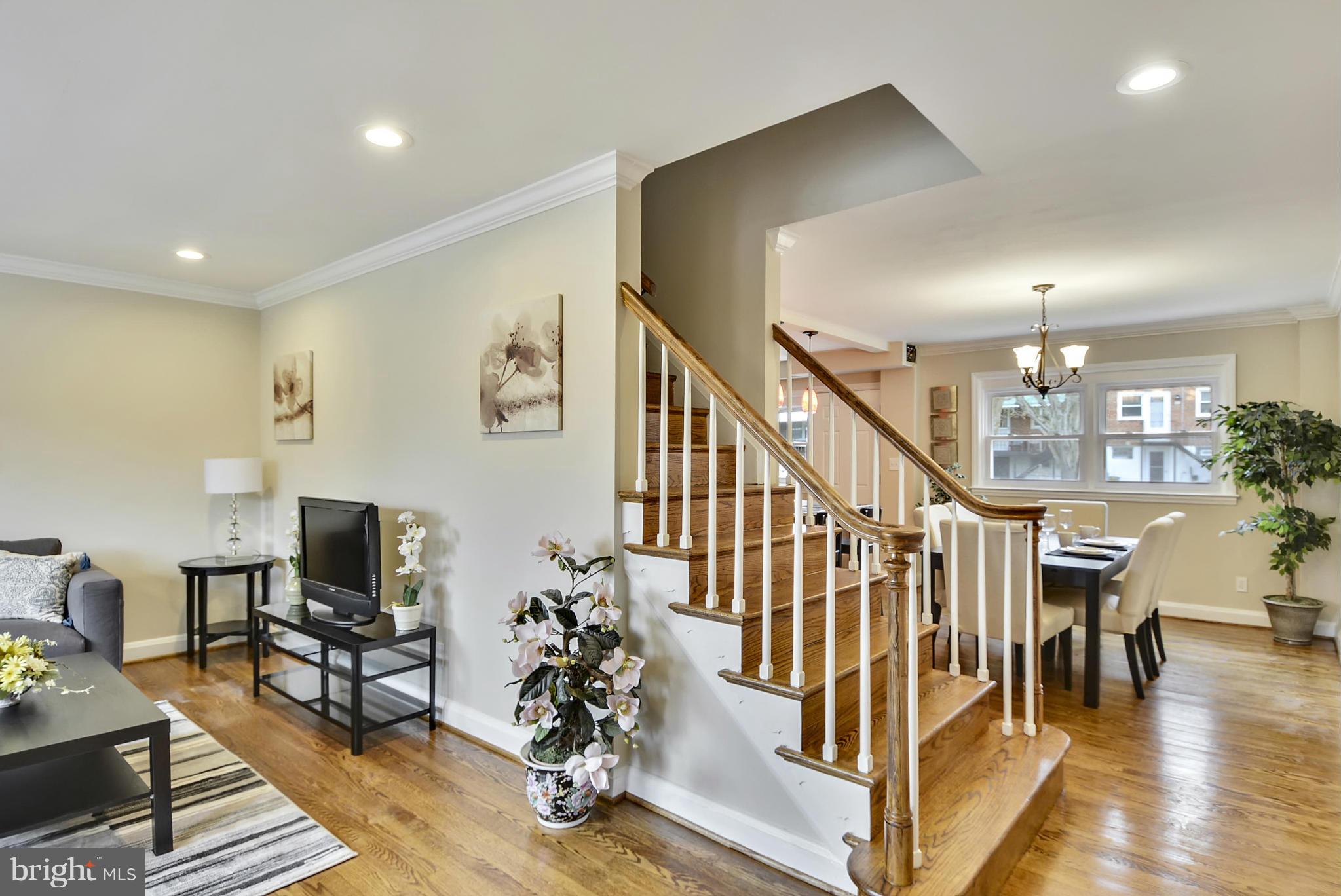 1602 Heathfield Road Baltimore, MD 21239 - Photo 10 of 27 a living room with furniture and wooden floor