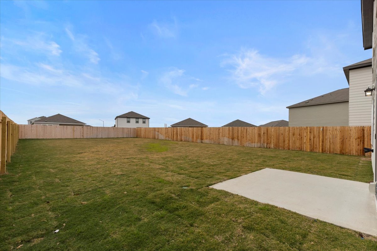 113 Rother Place Taylor, TX 76574 - Photo 29 of 34 Fenced backyard featuring a patio