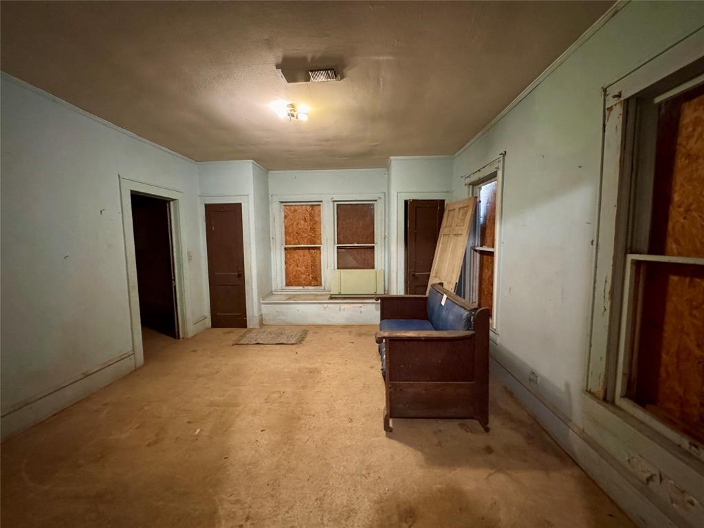 807 North Marable Street West, TX 76691 - Photo 11 of 27 a living room with furniture and a window