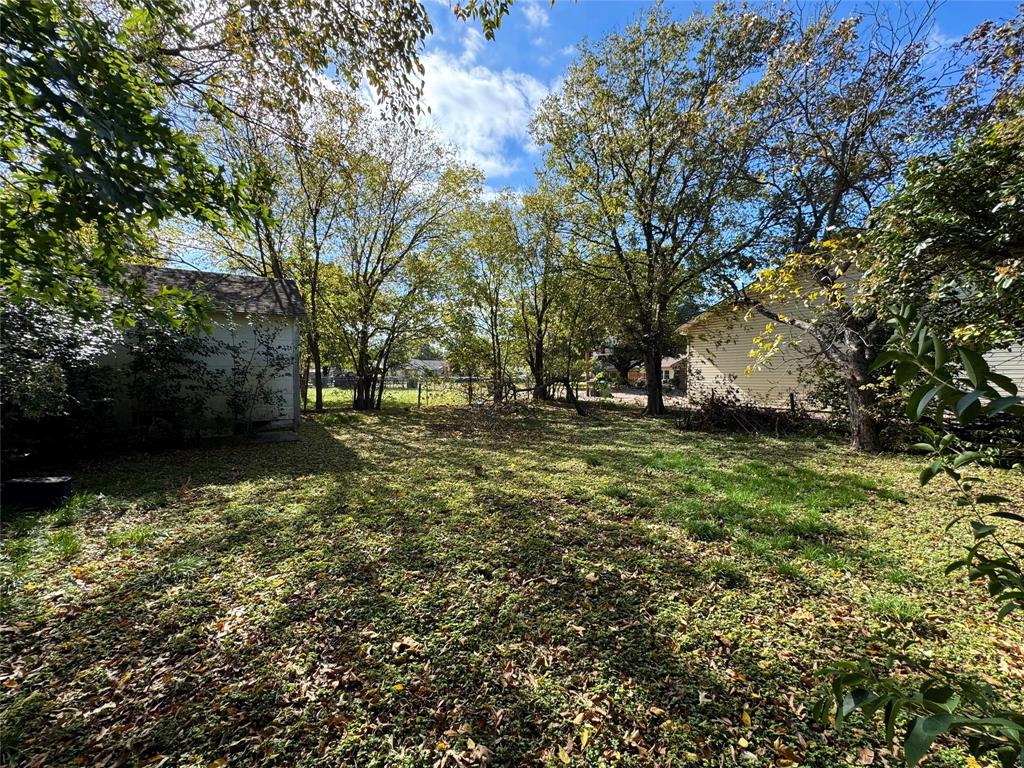 807 North Marable Street West, TX 76691 - Photo 20 of 27 a view of outdoor space with deck and yard