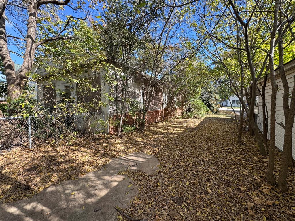 807 North Marable Street West, TX 76691 - Photo 27 of 27 a view of dirt yard with a tree