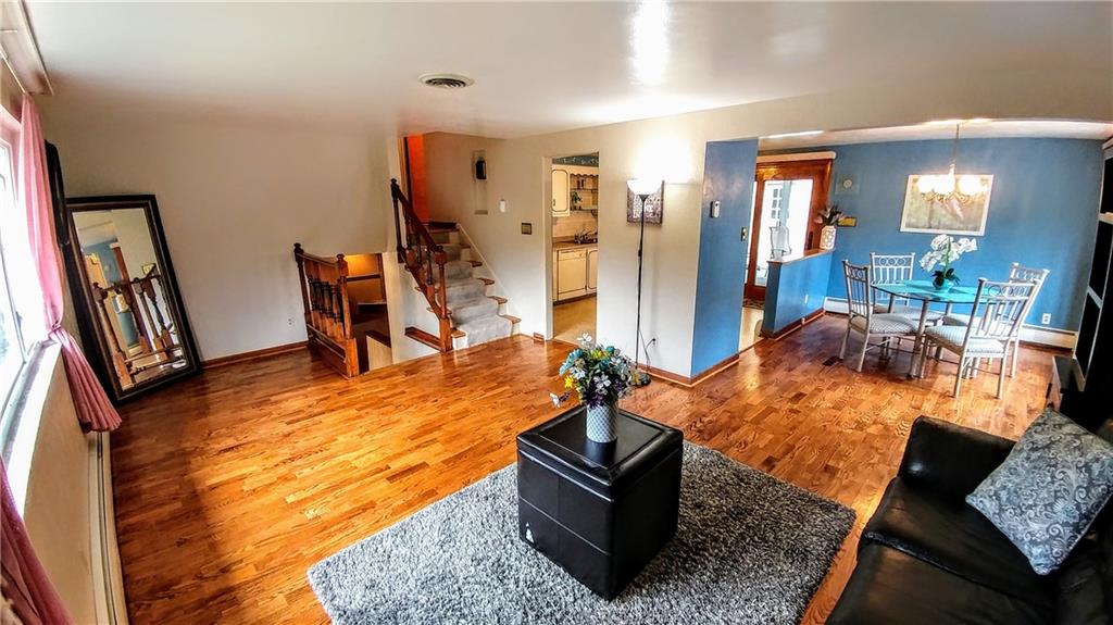 148 Morgan Hill Road Cuddy, PA 15031 - Photo 2 of 25 This semi-open layout is simply the best! Separate, yet open just enough to not miss a thing when entertaining guests. And look at these newer hardwood floors-gorgeous!