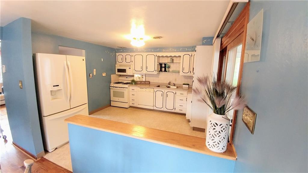 148 Morgan Hill Road Cuddy, PA 15031 - Photo 12 of 25 Light and bright! This kitchen is very welcoming and waiting for you to cook up a fantastic meal. Eat in kitchen? Yes! Plenty of space for one!