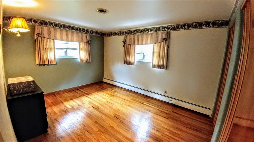 148 Morgan Hill Road Cuddy, PA 15031 - Photo 15 of 25 This master bedroom has those gleaming hardwood floors and his and her closets!