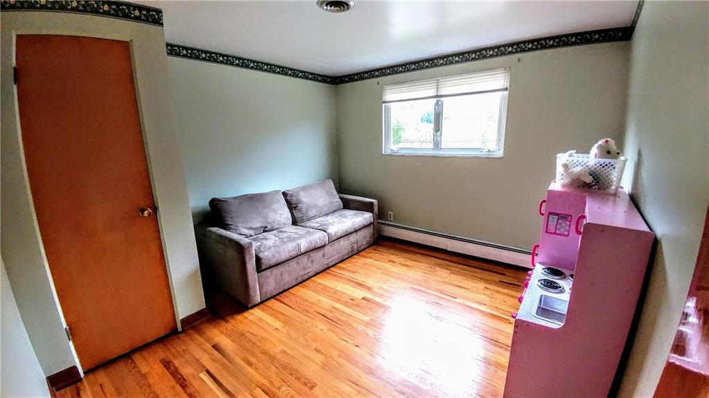 148 Morgan Hill Road Cuddy, PA 15031 - Photo 19 of 25 This third bedroom completes this upper level, a calming light neutral green, which would also make a great play space, office, closet or whatever your heart desires!