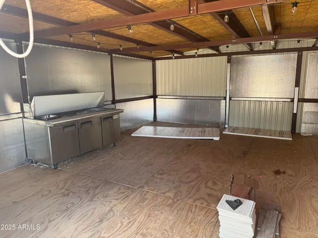 a view of a slide with sitting area