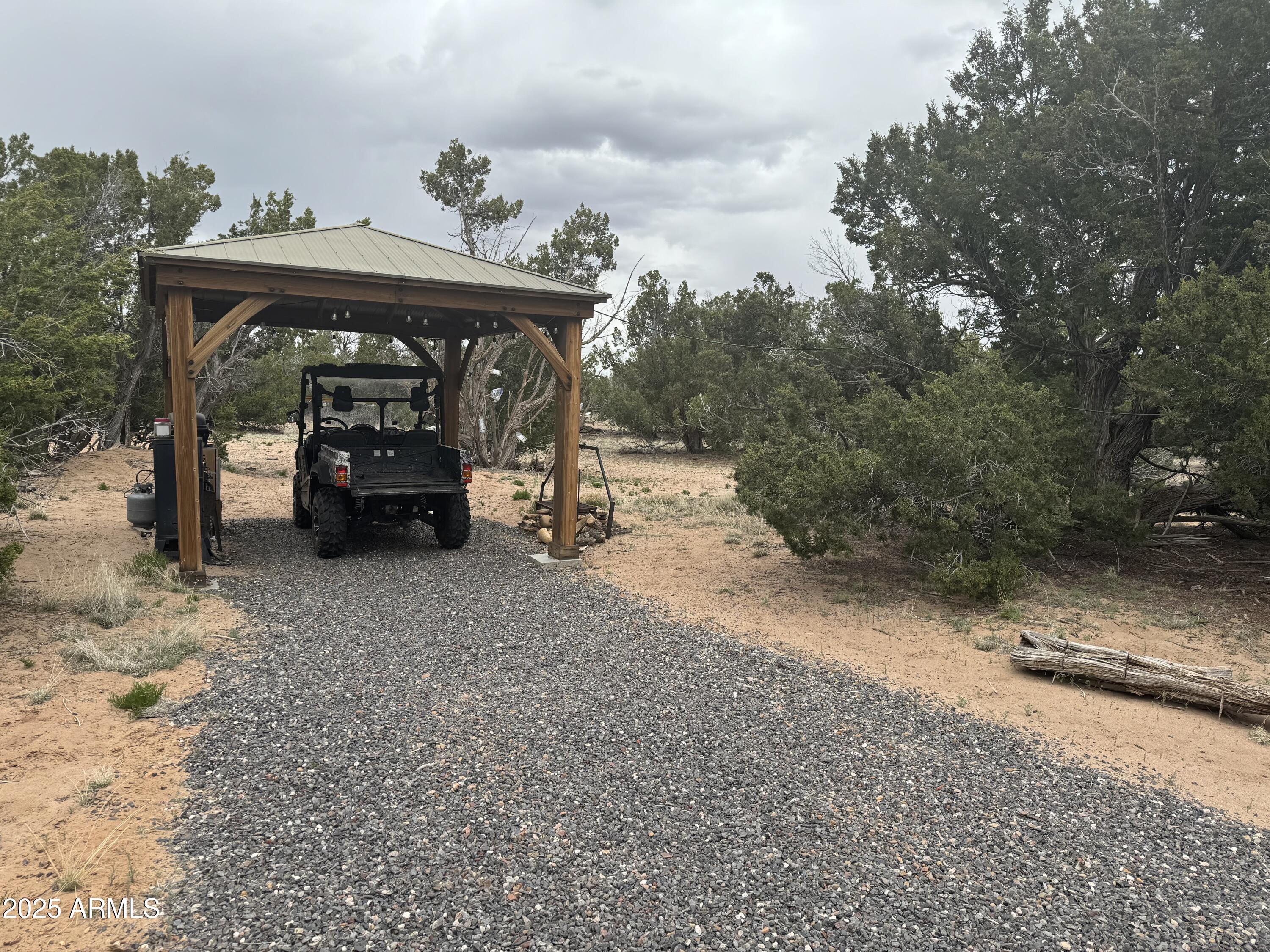 Lot 64 Sierra Mountain Ranch, Unit 64 St. Johns, AZ 85936 - Photo 23 of 38 a view of a car parked on the side of the road