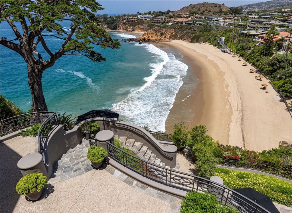 199 Emerald Bay Laguna Beach, CA 92651 - Photo 4 of 23 a view of a lake with a yard