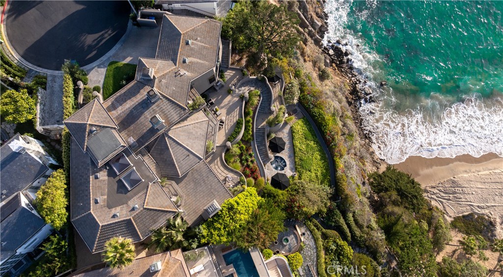 199 Emerald Bay Laguna Beach, CA 92651 - Photo 9 of 23 an aerial view of a house with a yard and garden