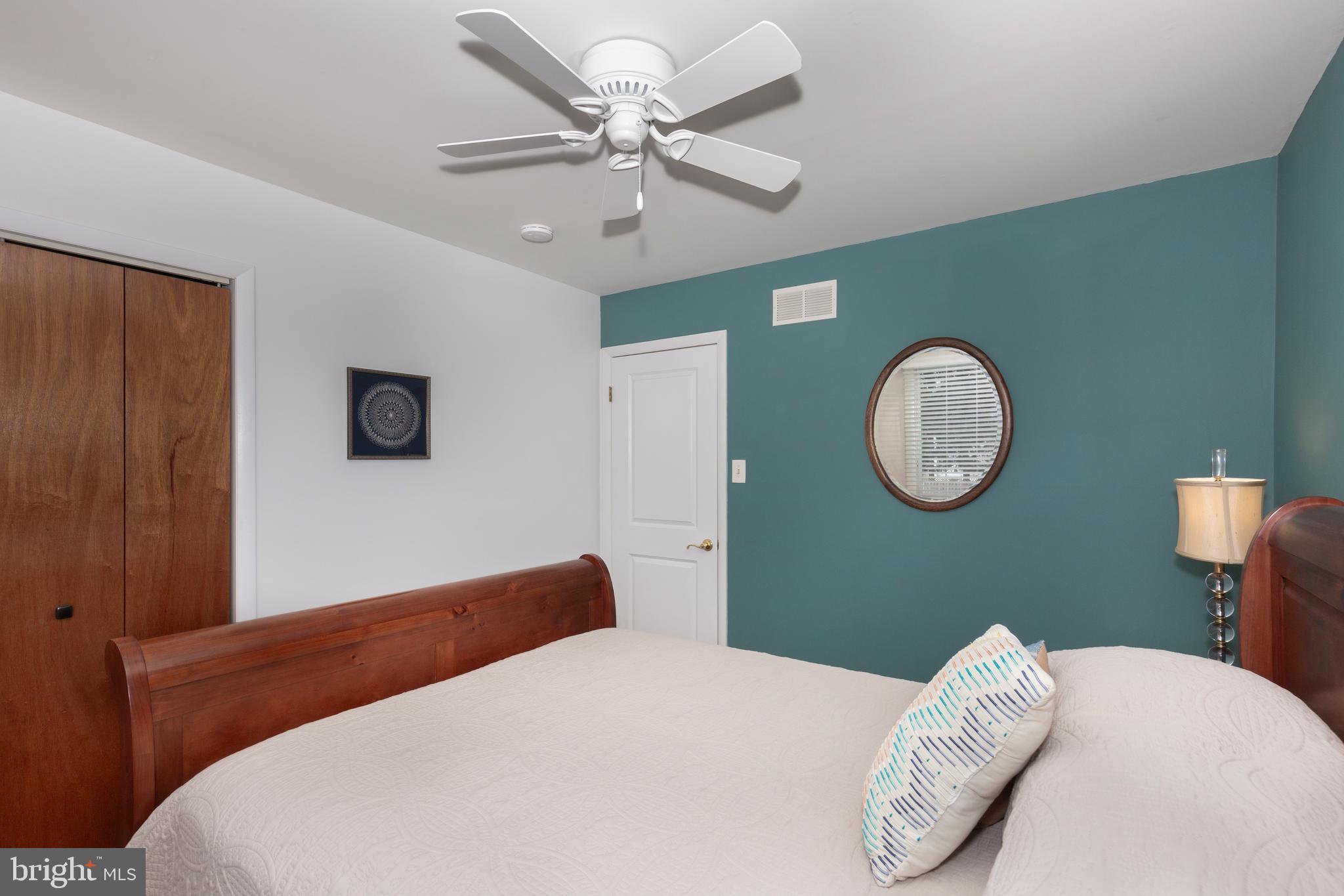 4316 Utz Road Hampstead, MD 21074 - Photo 19 of 82 a bedroom with a bed and a chandelier