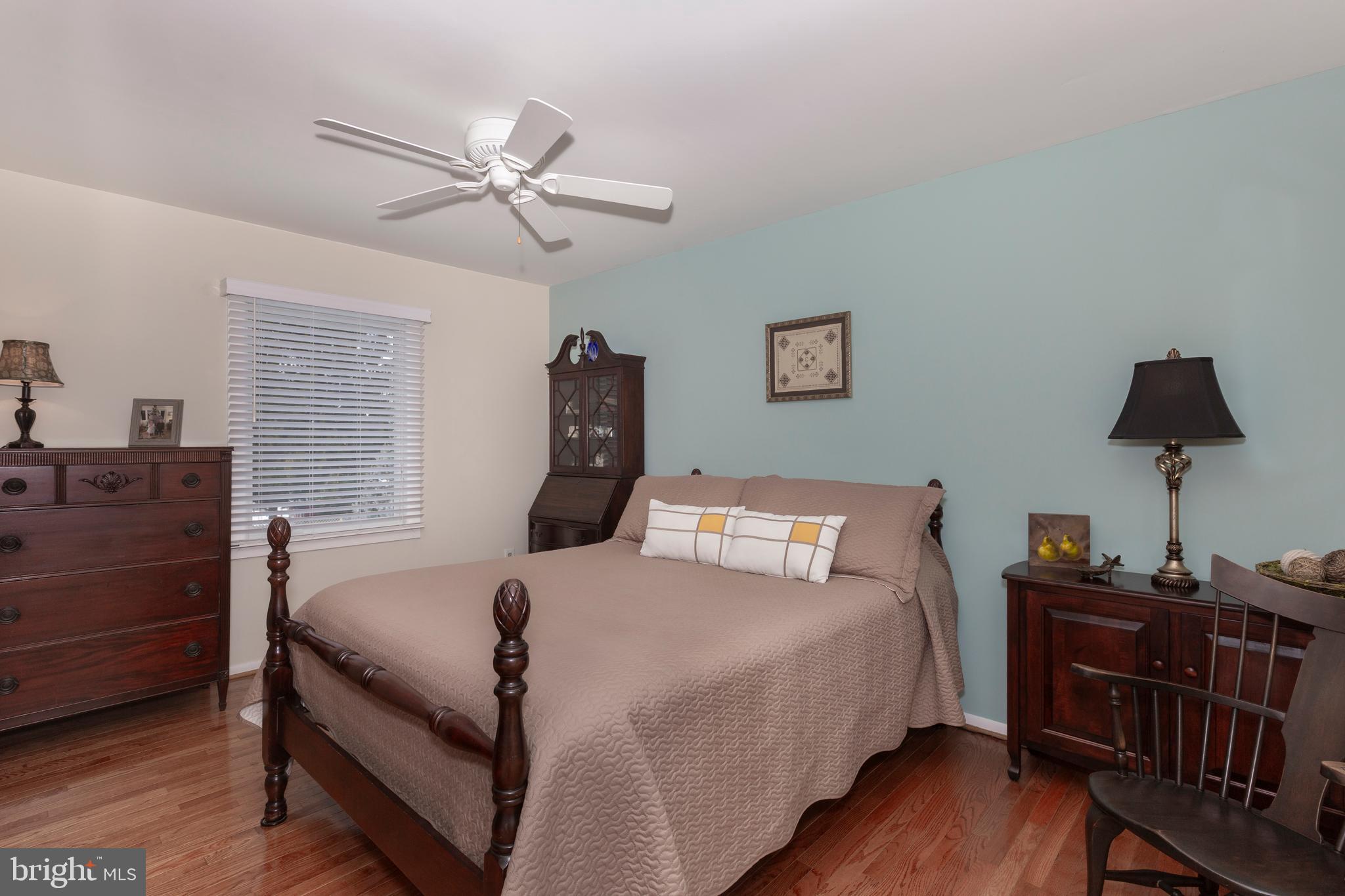 4316 Utz Road Hampstead, MD 21074 - Photo 20 of 82 a bedroom with a bed and wooden floor