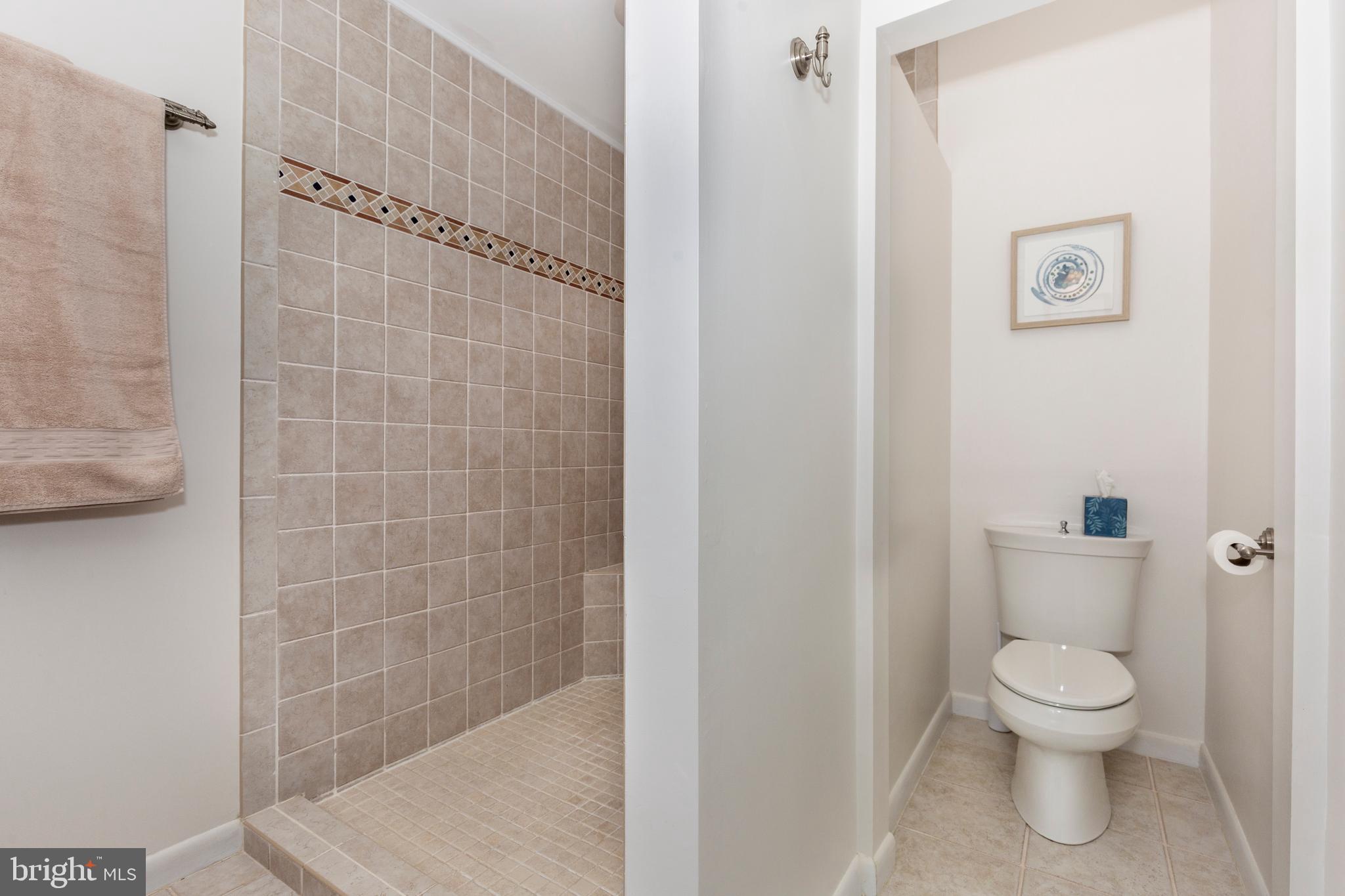 4316 Utz Road Hampstead, MD 21074 - Photo 28 of 82 a white toilet sitting next to a shower