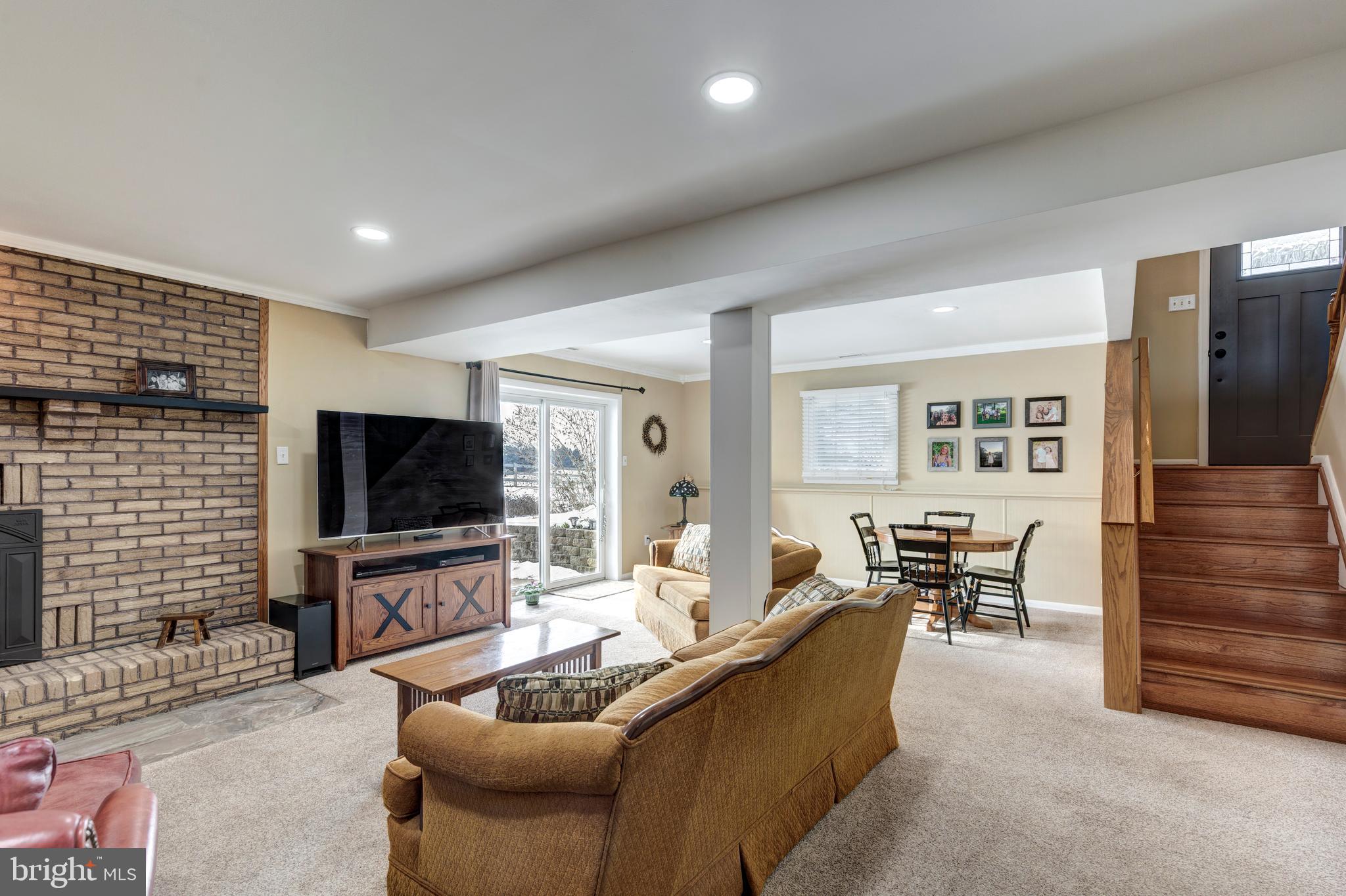 4316 Utz Road Hampstead, MD 21074 - Photo 34 of 82 a living room with furniture and a flat screen tv