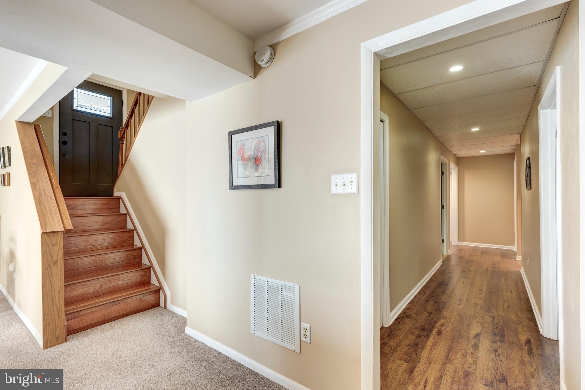 4316 Utz Road Hampstead, MD 21074 - Photo 38 of 82 a view of a hallway with wooden floor and entryway
