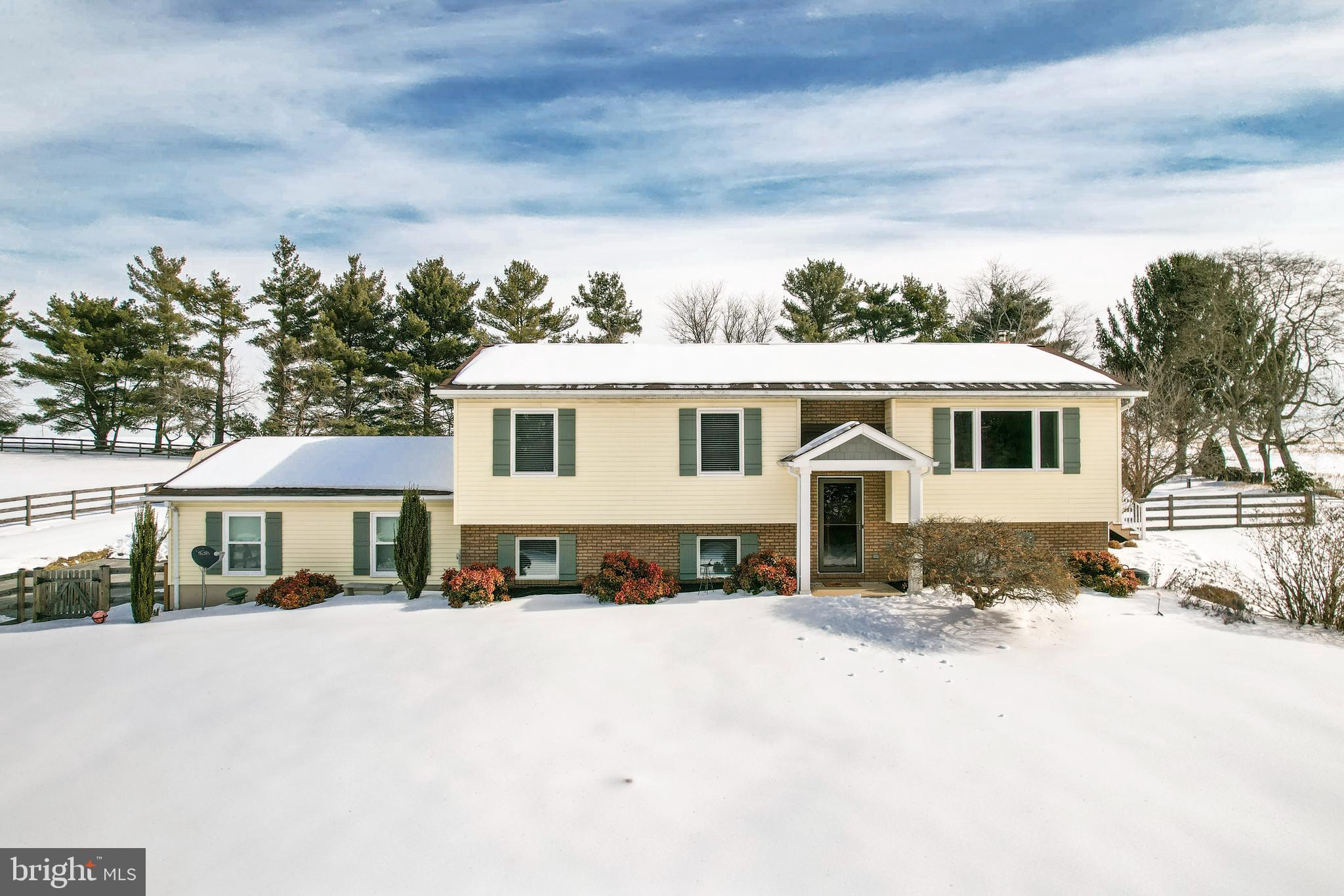 4316 Utz Road Hampstead, MD 21074 - Photo 4 of 82 a front view of a house with a yard
