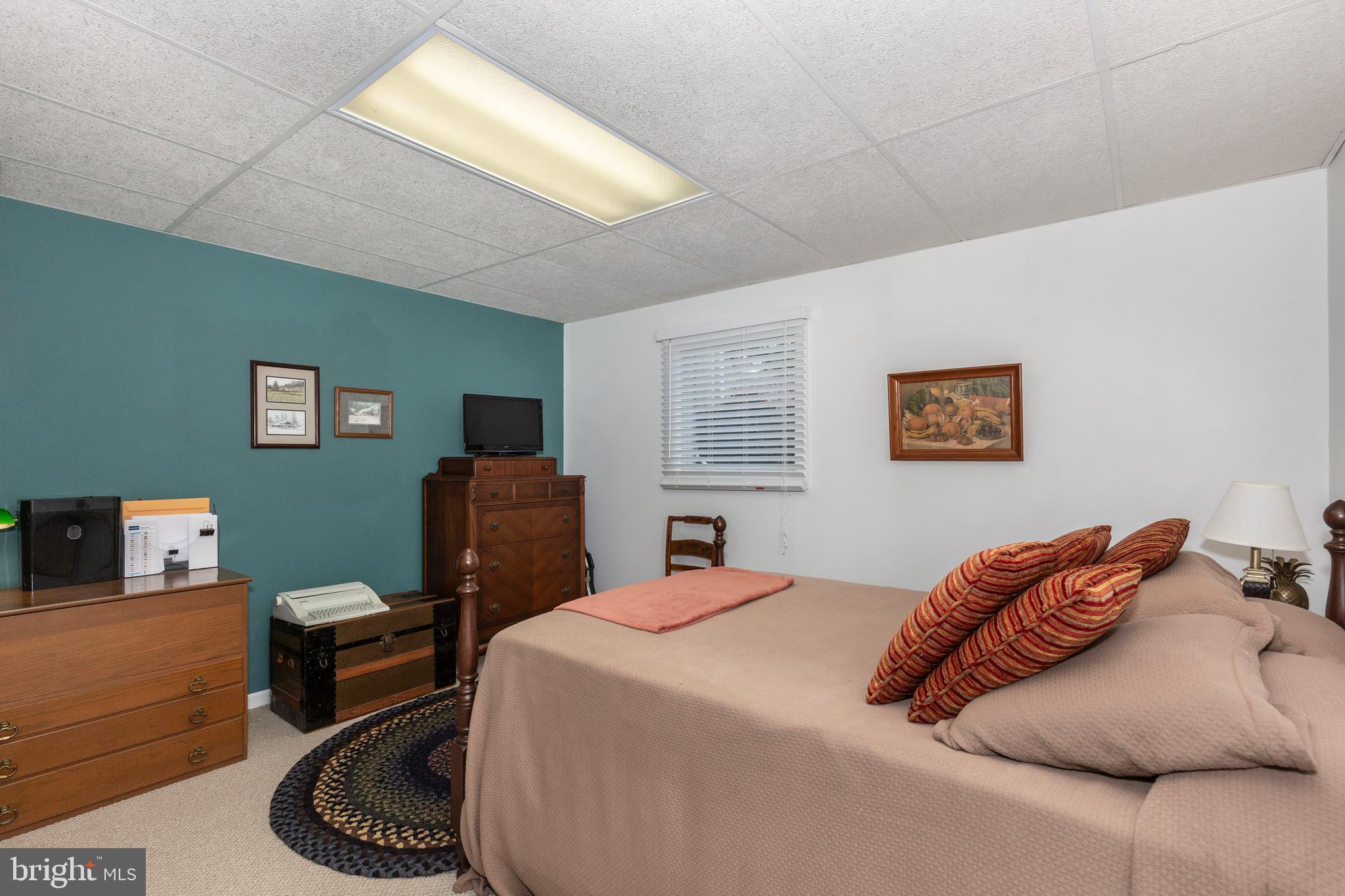 4316 Utz Road Hampstead, MD 21074 - Photo 45 of 82 a bedroom with a bed and a television