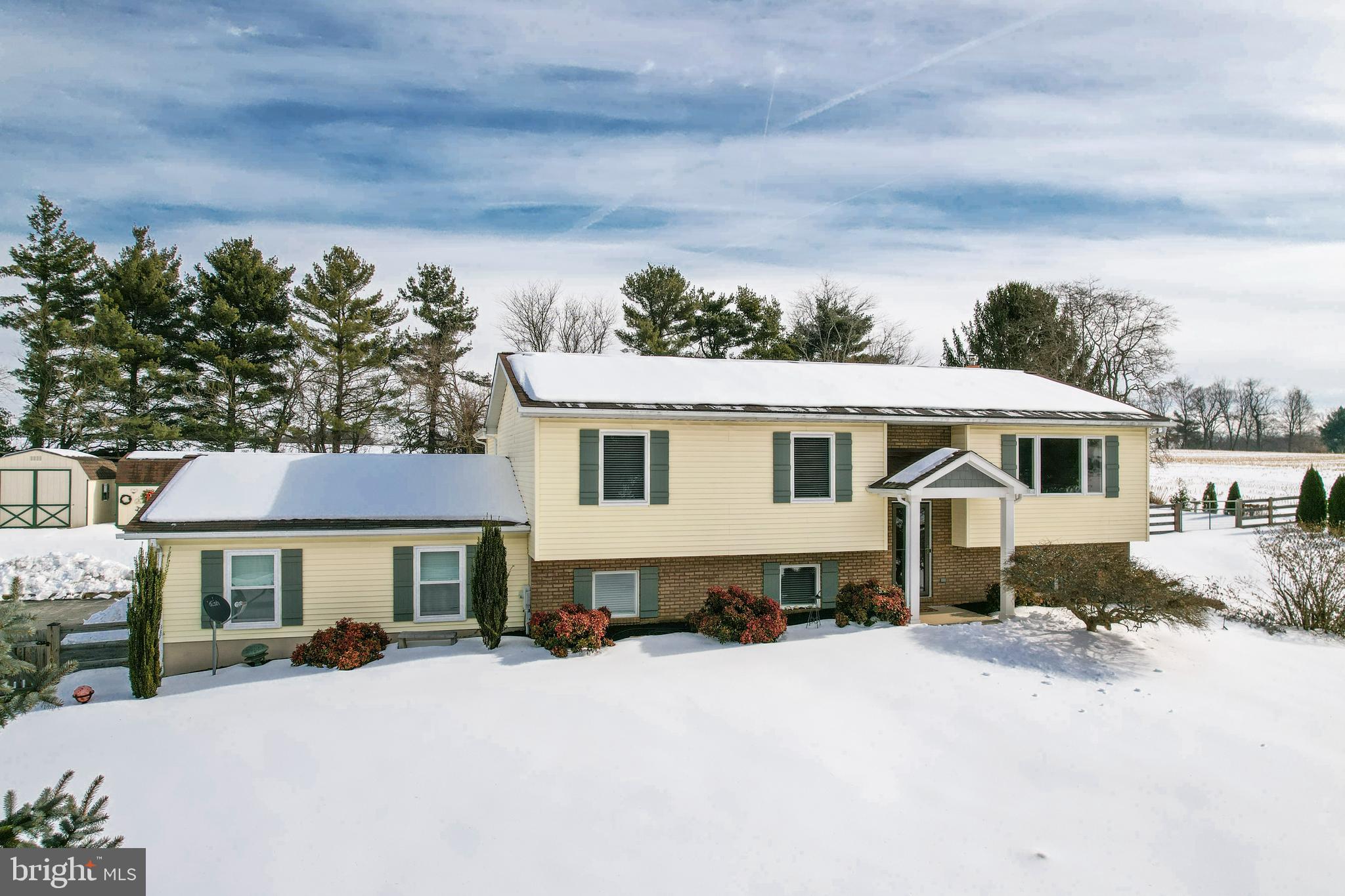 4316 Utz Road Hampstead, MD 21074 - Photo 52 of 82 a front view of a house with a yard and garage