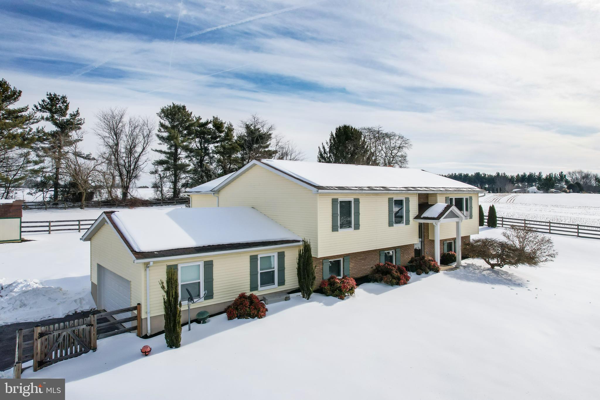 4316 Utz Road Hampstead, MD 21074 - Photo 53 of 82 a view of a white house with a big yard and large trees