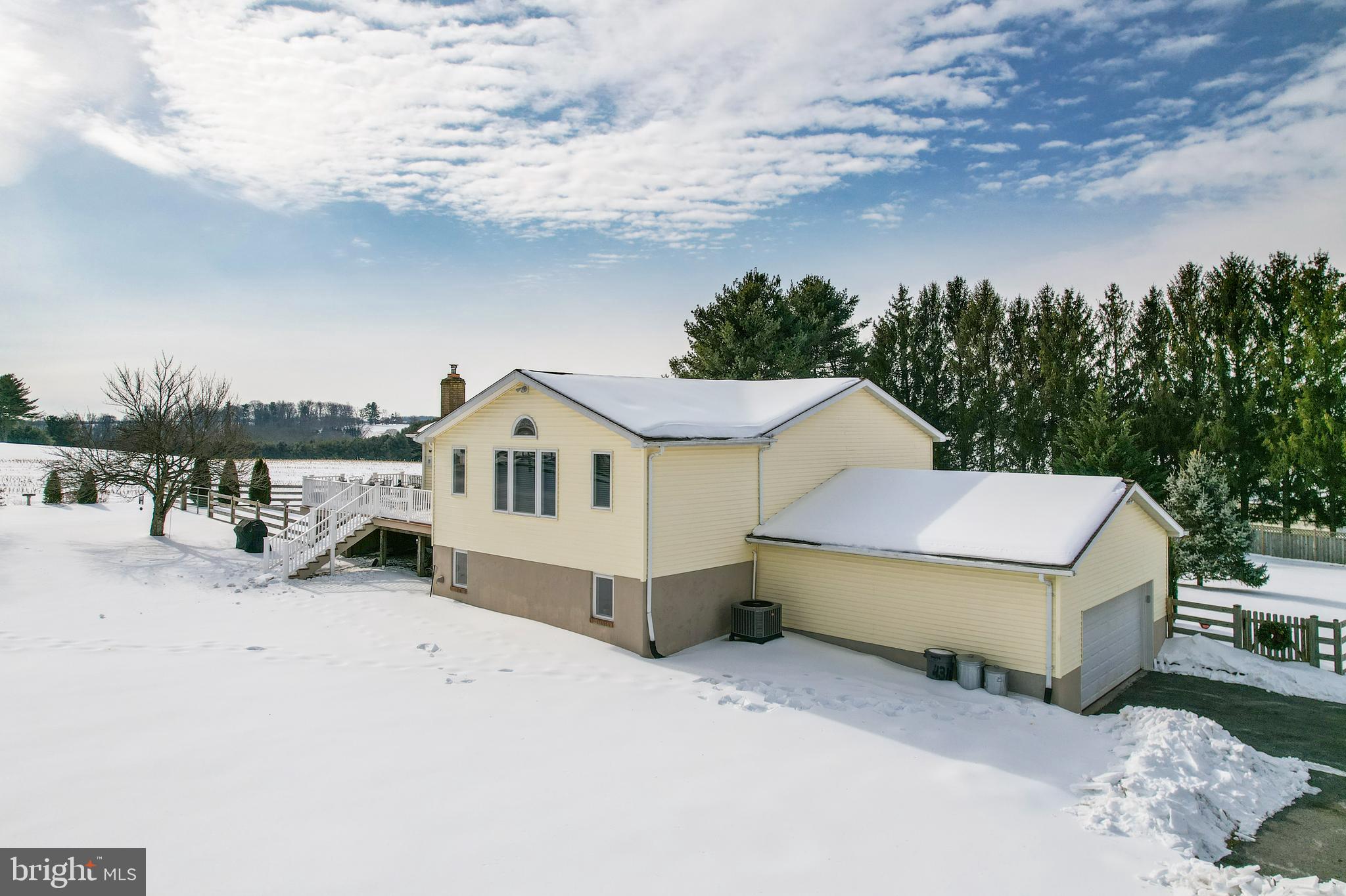 4316 Utz Road Hampstead, MD 21074 - Photo 56 of 82 a view of a house with a yard covered in snow