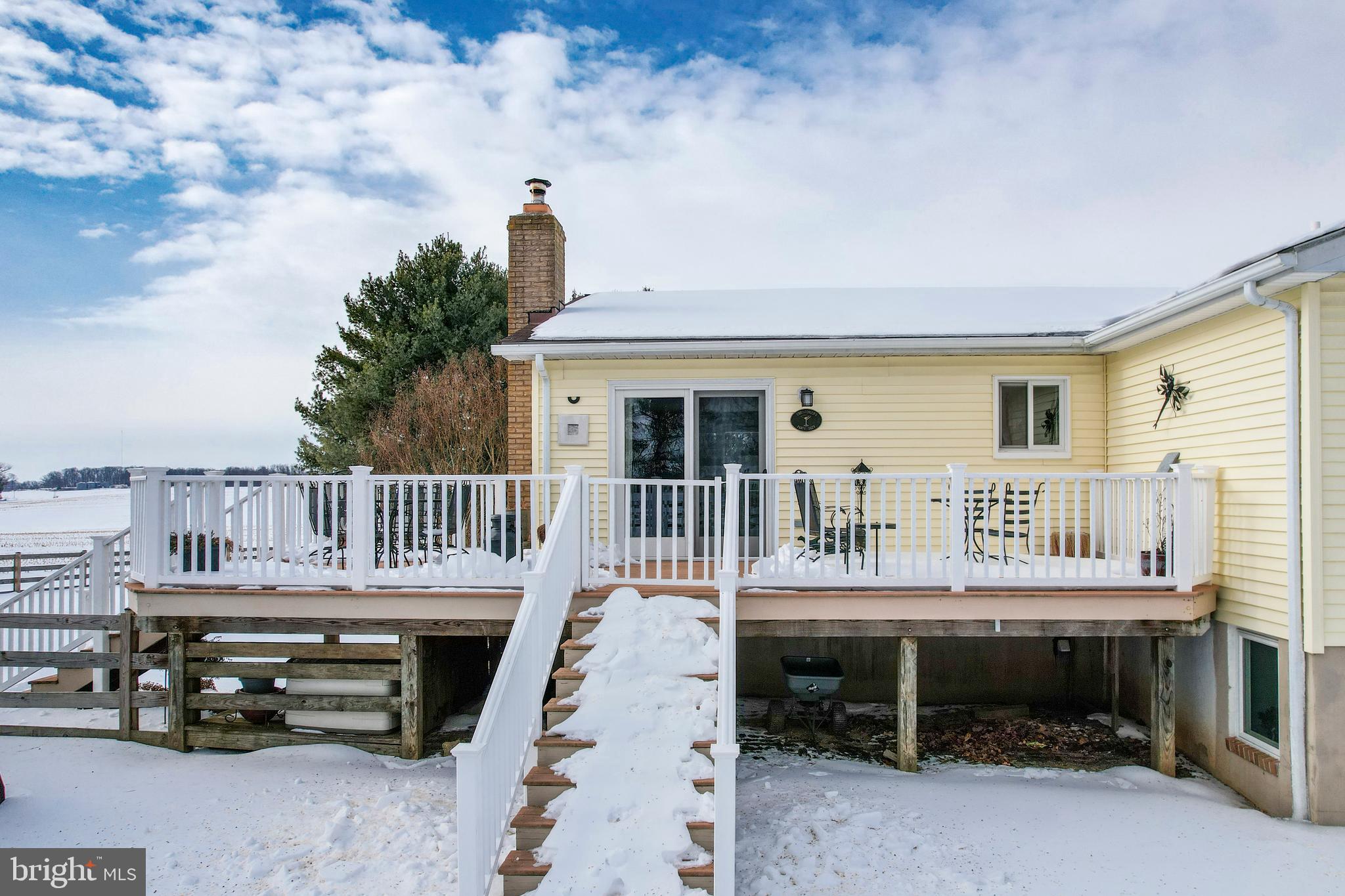 4316 Utz Road Hampstead, MD 21074 - Photo 72 of 82 a balcony with a table and chairs