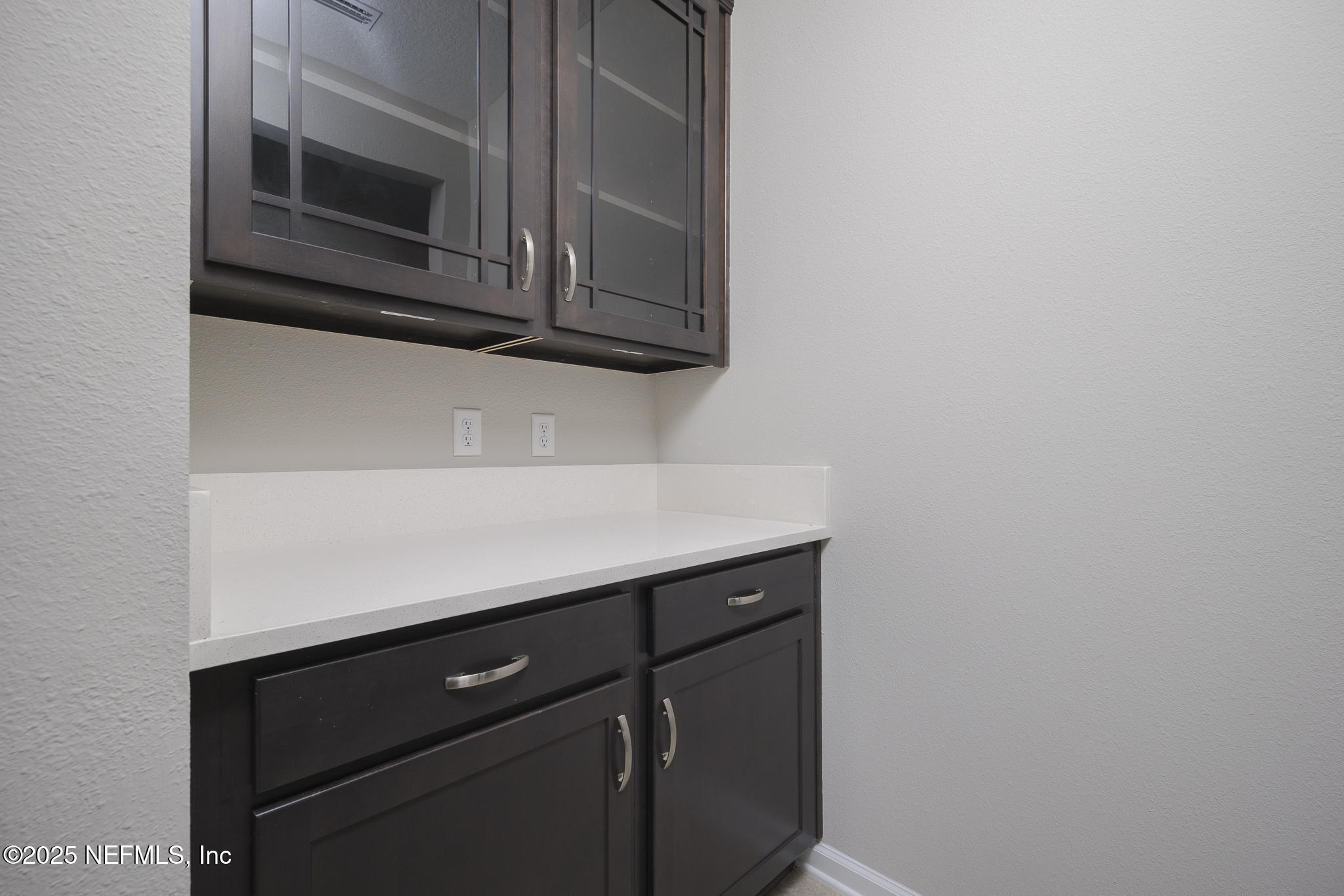 299 Clarys Run St. Augustine, FL 32092 - Photo 15 of 39 a kitchen with a cabinets and a microwave
