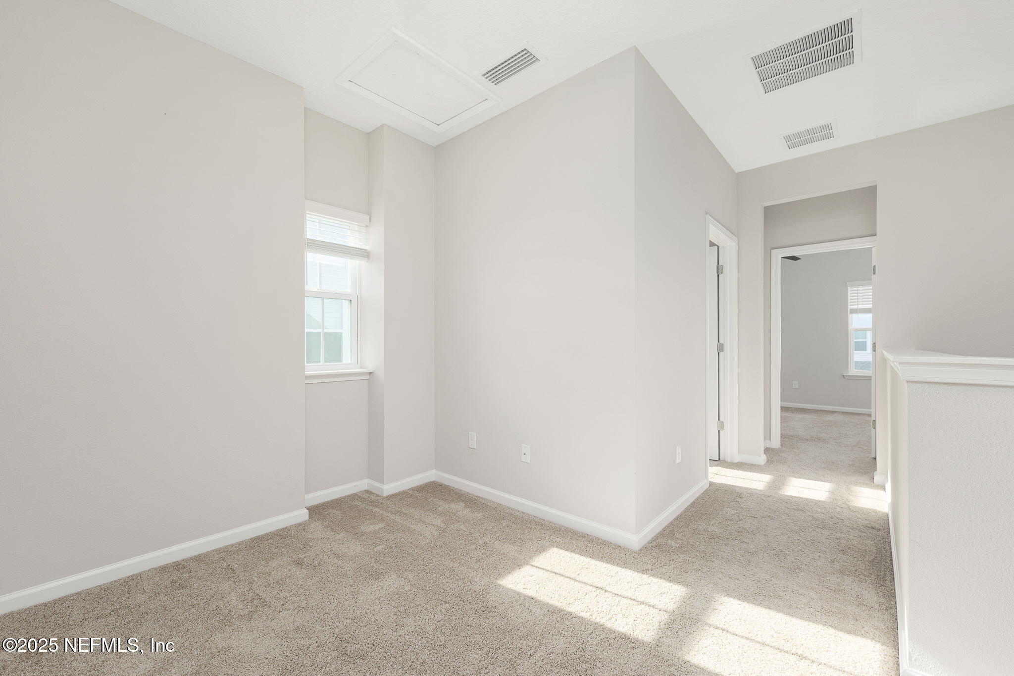 299 Clarys Run St. Augustine, FL 32092 - Photo 18 of 39 a view of a room that has a window in it