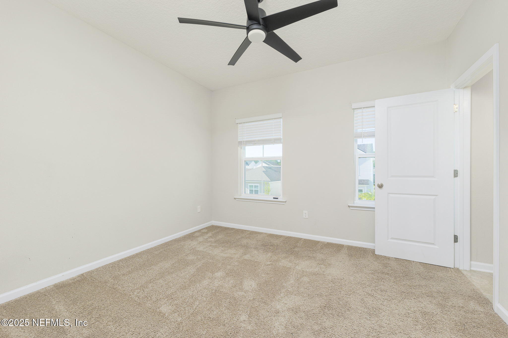 299 Clarys Run St. Augustine, FL 32092 - Photo 28 of 39 a view of an empty room with a window