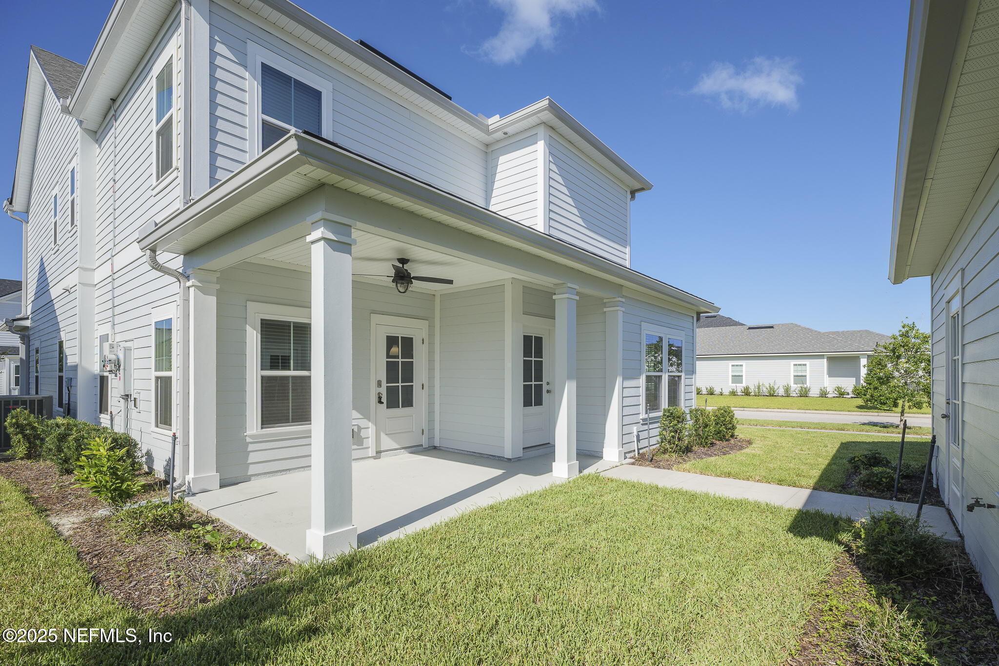 299 Clarys Run St. Augustine, FL 32092 - Photo 32 of 39 a view of a house with a yard patio and fire pit