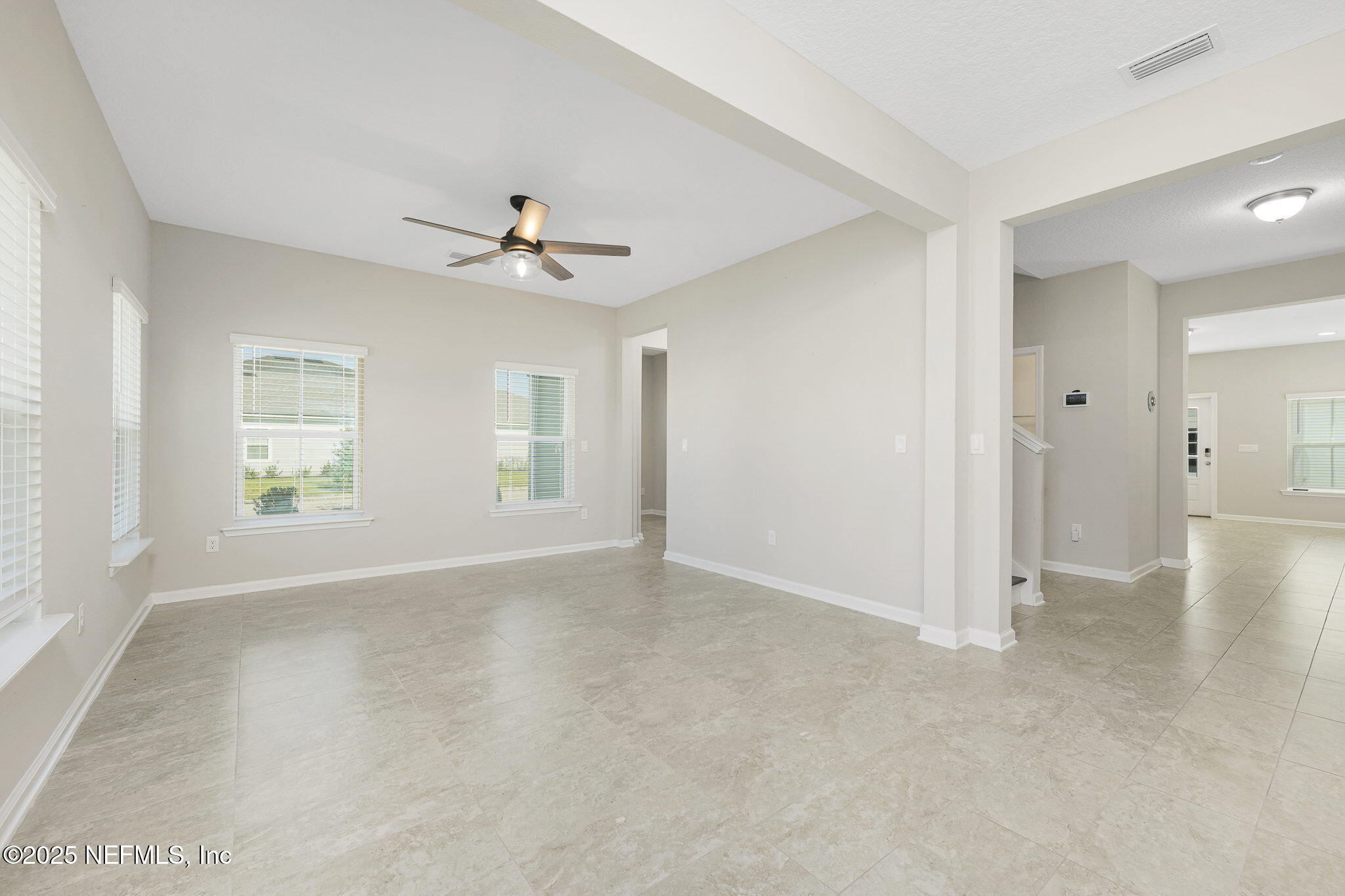 299 Clarys Run St. Augustine, FL 32092 - Photo 5 of 39 a view of an empty room with a window