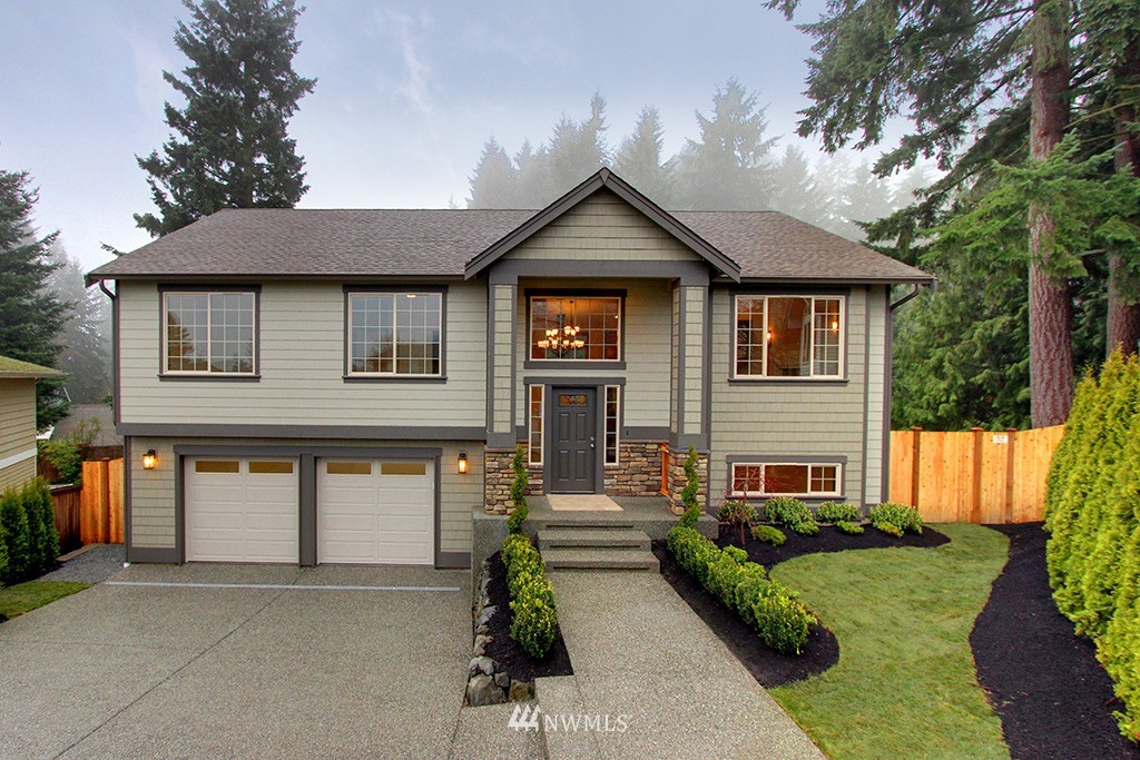 216 225th Street Southeast Bothell, WA 98021 - Photo 1 of 1 a front view of a house with a yard