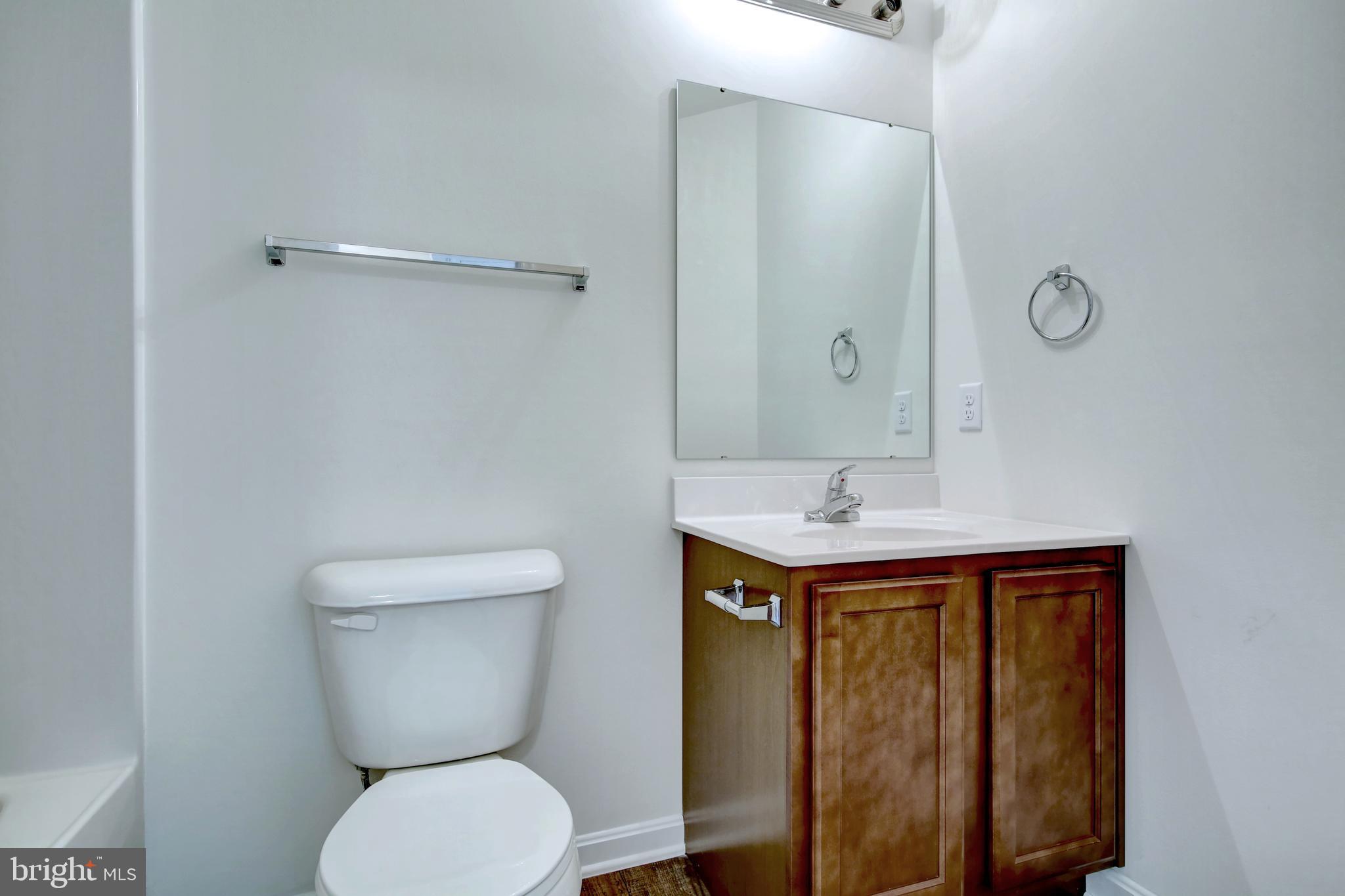 18 Grace Avenue Hanover, PA 17331 - Photo 11 of 15 a bathroom with a toilet sink and mirror