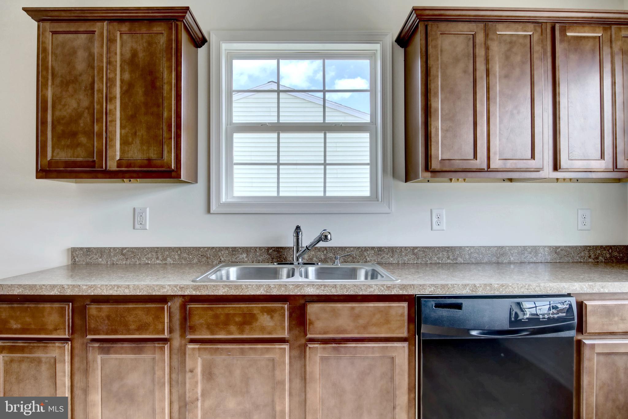 18 Grace Avenue Hanover, PA 17331 - Photo 15 of 15 a kitchen with granite countertop a sink and cabinets