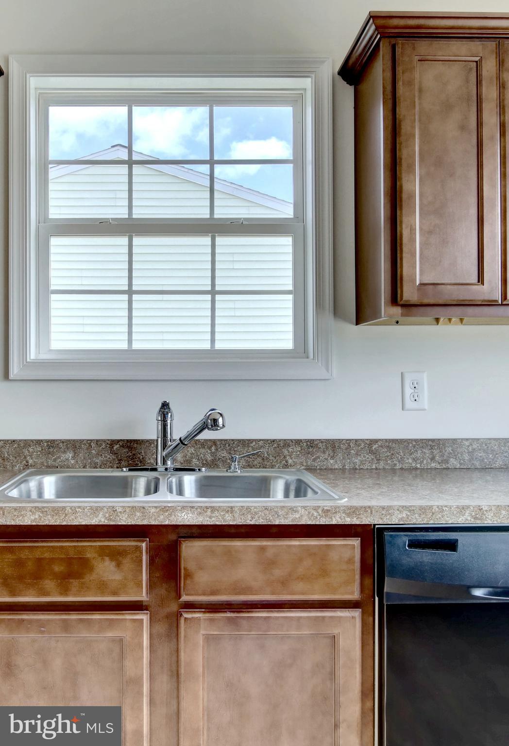 18 Grace Avenue Hanover, PA 17331 - Photo 4 of 15 a kitchen with granite countertop a sink and a window