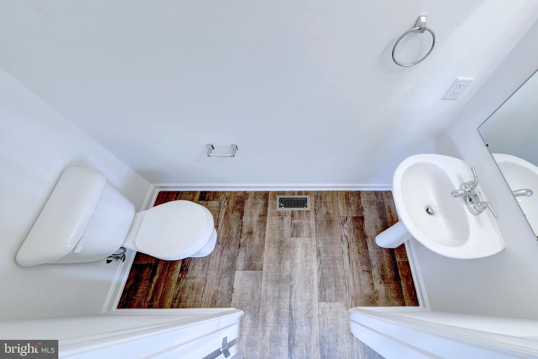 18 Grace Avenue Hanover, PA 17331 - Photo 6 of 15 a bathroom with a toilet sink and mirror
