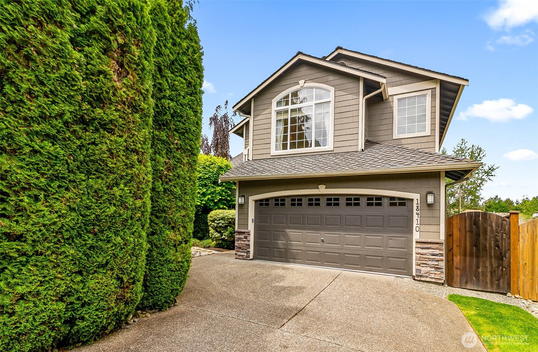 18410 11th Drive Southeast Bothell, WA 98012 - Photo 1 of 40 a front view of a house with a garage