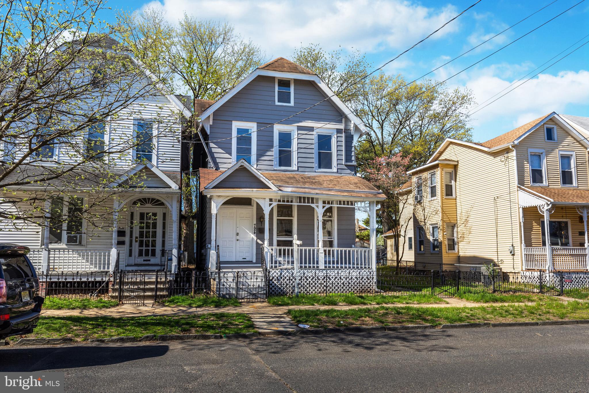 724 Hunter Street Gloucester City, NJ 08030 - Photo 1 of 47 a front view of a house with a small yard