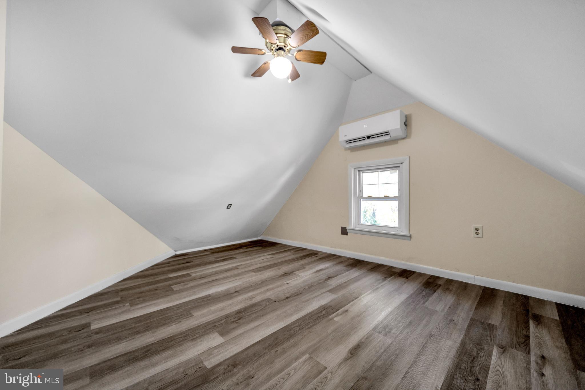 724 Hunter Street Gloucester City, NJ 08030 - Photo 18 of 47 a view of empty room with wooden floor and fan