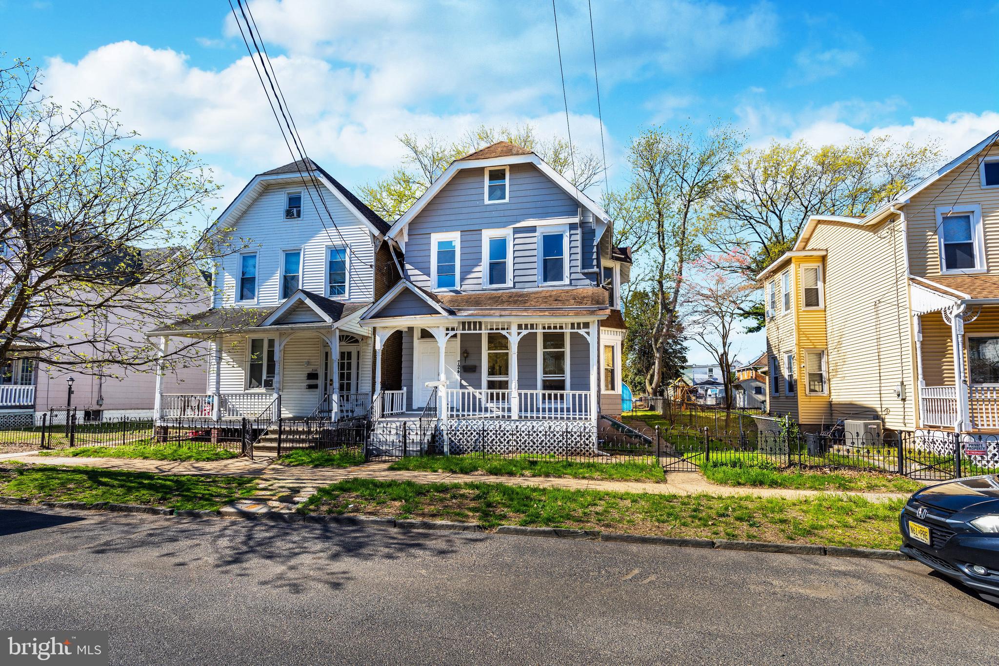 724 Hunter Street Gloucester City, NJ 08030 - Photo 2 of 47 a front view of a house with garden