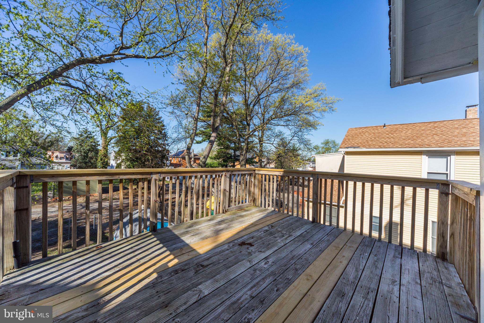 724 Hunter Street Gloucester City, NJ 08030 - Photo 21 of 47 a view of balcony with wooden floor and fence