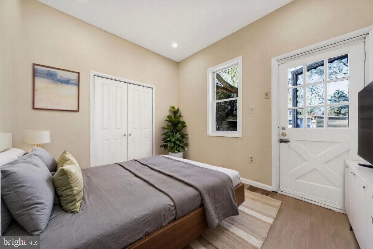 724 Hunter Street Gloucester City, NJ 08030 - Photo 29 of 47 a bedroom with a large bed and a window