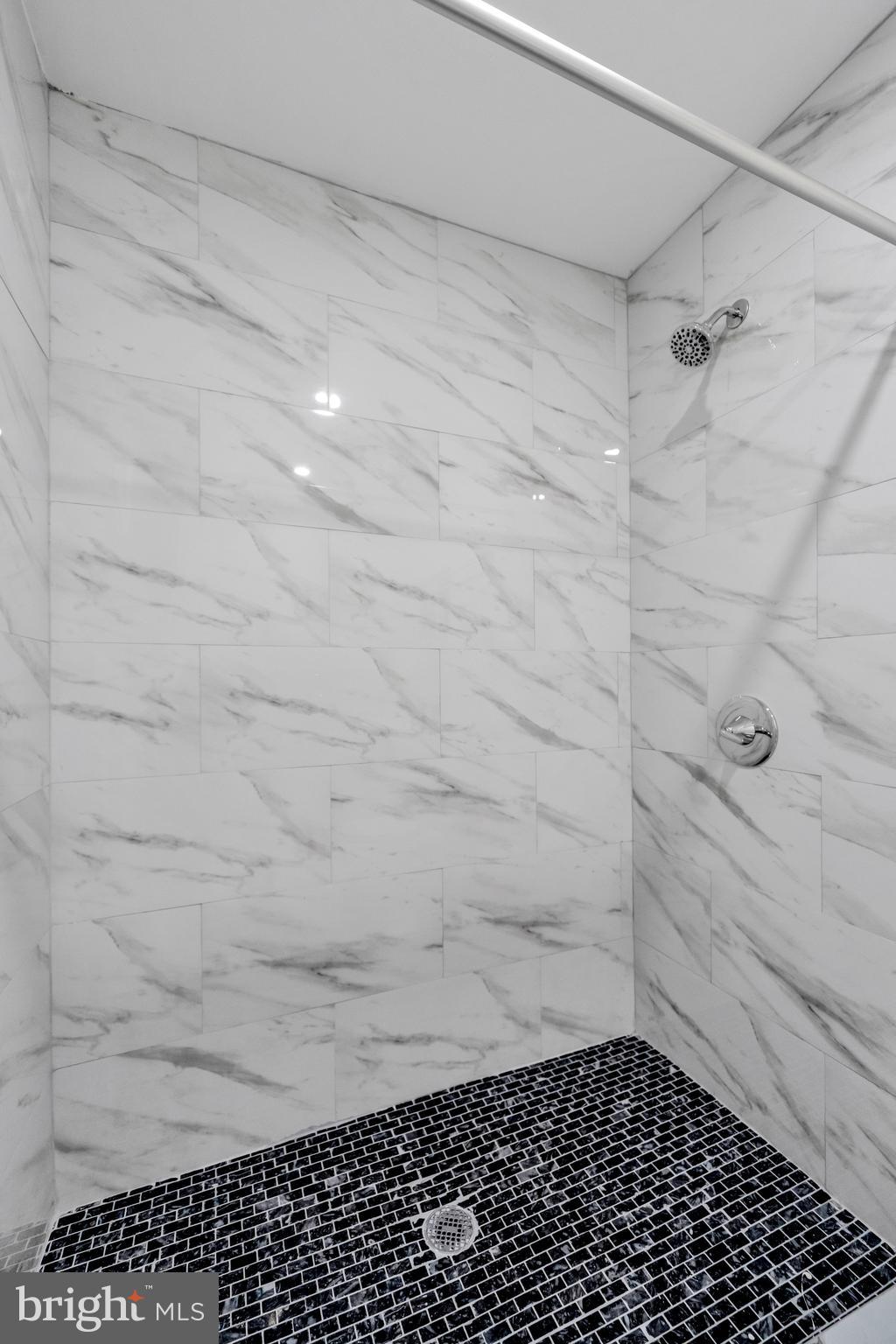 724 Hunter Street Gloucester City, NJ 08030 - Photo 32 of 47 a bathroom with a shower
