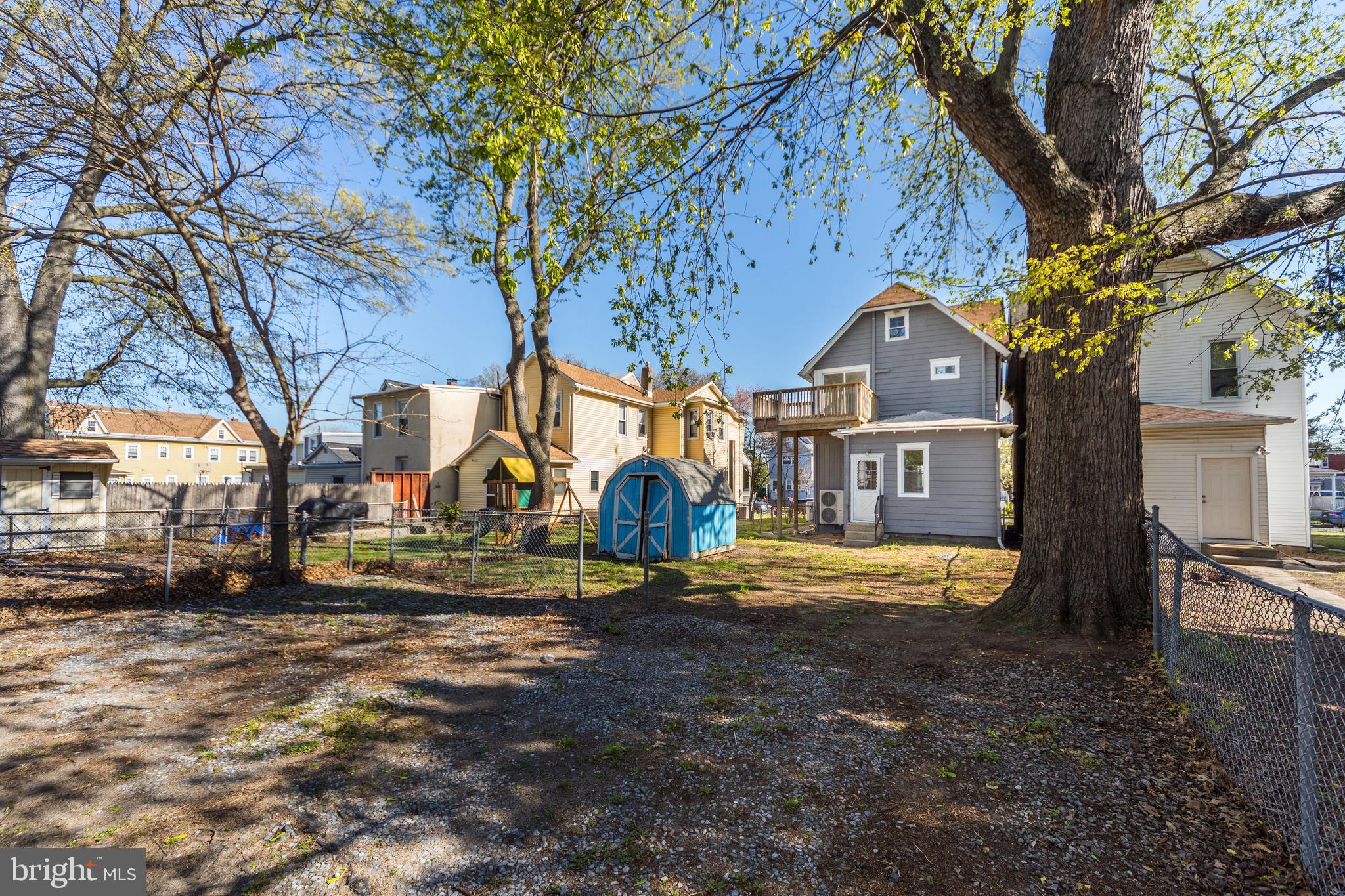 724 Hunter Street Gloucester City, NJ 08030 - Photo 40 of 47 a view of large house with a yard