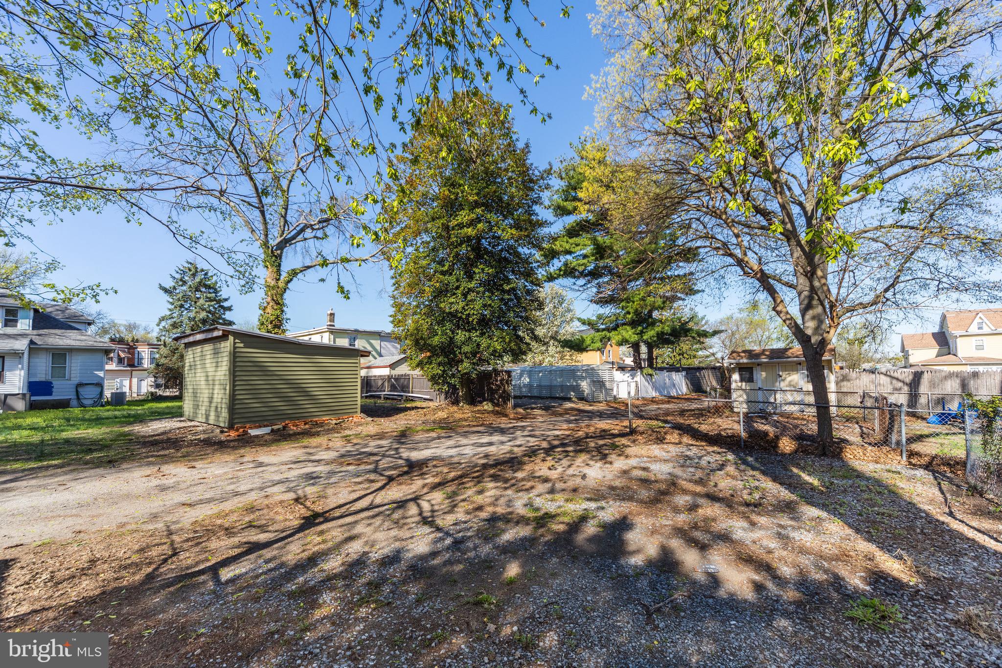 724 Hunter Street Gloucester City, NJ 08030 - Photo 41 of 47 a view of a yard with large trees