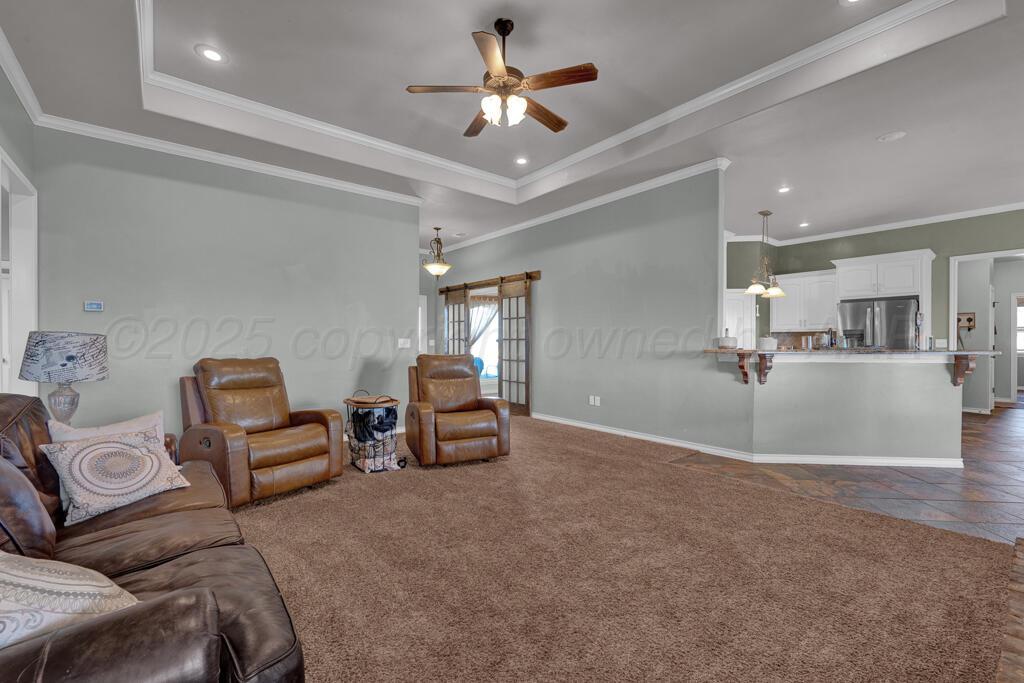 17801 Stone Creek Road Amarillo, TX 79124 - Photo 5 of 31 a view of a livingroom with furniture and a chandelier