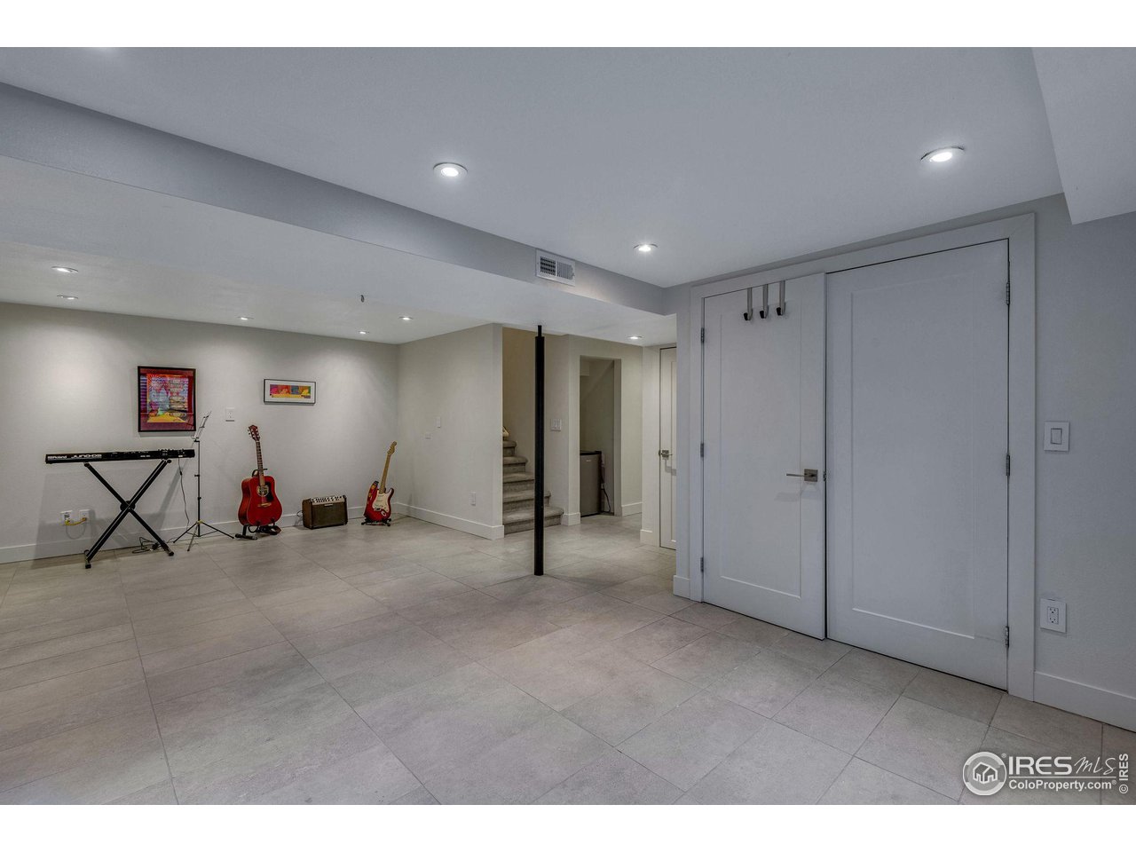 908 Clover Circle Lafayette, CO 80026 - Photo 29 of 40 a view of a room with gym equipment