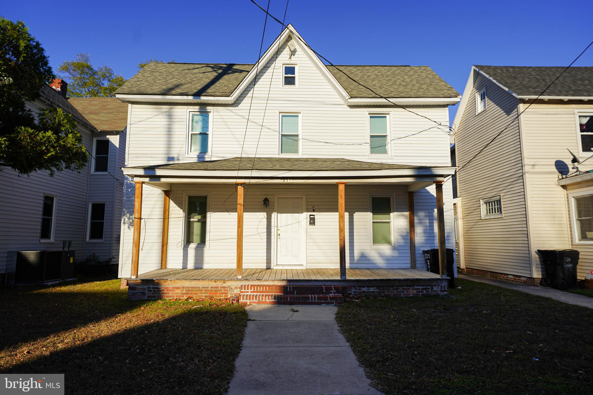 231 Newton Street, Unit A Salisbury, MD 21801 - Photo 2 of 38 a front view of a house with a yard
